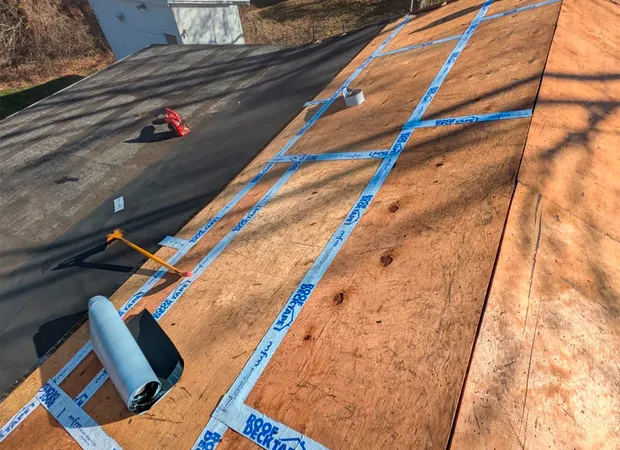 Roof deck tape application