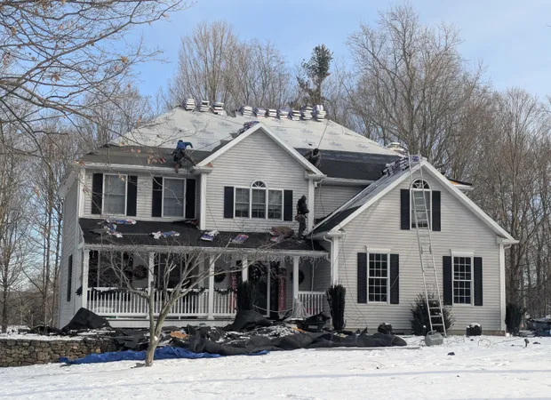 Full roof replacement in progress