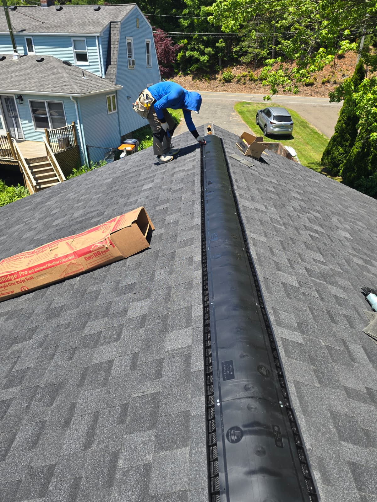 Ridge vent installation on shingle roof