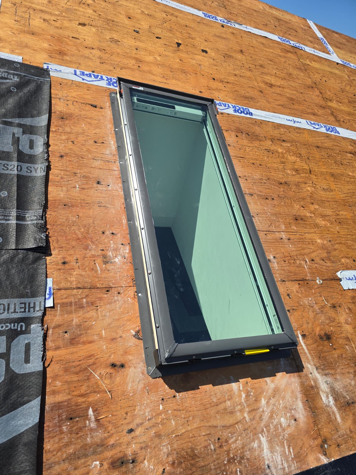 Skylight installation on roof deck
